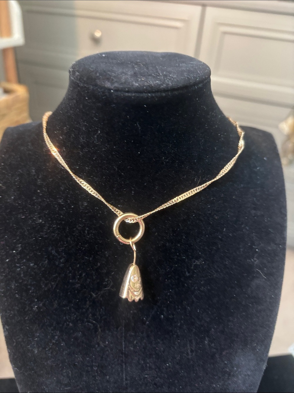Elegant Gold-Tone Pendant Necklace with Floral Charm